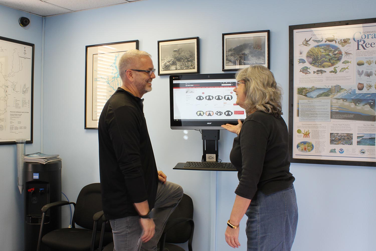 Customers at DGX e-commerce kiosk